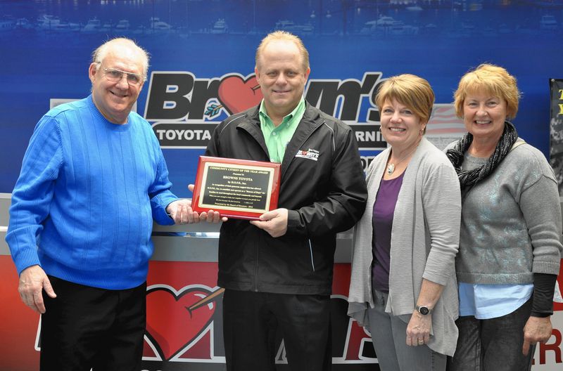 HOPE for All founder Leo Zerhusen, left, presented a Community Citizen of the Year award to Brown's Toyota General Manager John Stefero, along with HOPE board members Connie Cooper and Linda Swenson. The dealership made two significant donations to the nonprofit in the past year. (Amy Laque / Correspondent)